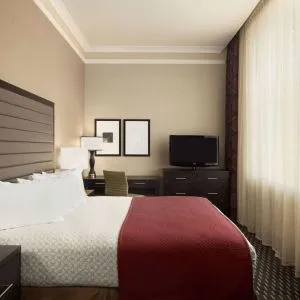 Day use room with work desk and natural light at Embassy Suites By Hilton St. Louis Downtown.