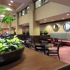 Dining area perfect for coworking at Embassy Suites By Hilton St. Louis Downtown.
