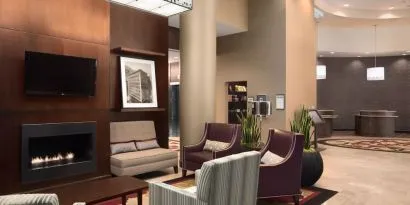 Lobby and coworking lounge at Embassy Suites By Hilton St. Louis Downtown.