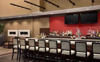 Hotel bar at Embassy Suites By Hilton St. Louis Downtown.