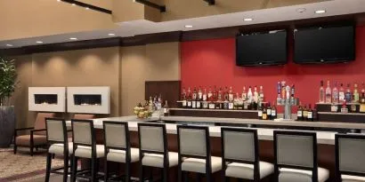 Hotel bar at Embassy Suites By Hilton St. Louis Downtown.