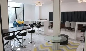 Lobby and coworking lounge at Liberty View Brooklyn Hotel.