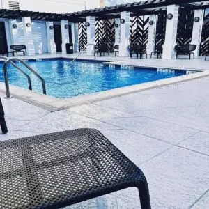 Refreshing outdoor pool at The Chifley Houston, Tapestry Collection By Hilton.