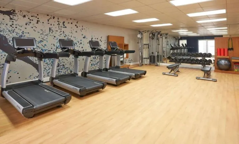 Fitness center at The Chifley Houston, Tapestry Collection By Hilton.