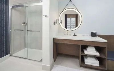 Guest bathroom with shower at The Chifley Houston, Tapestry Collection By Hilton.