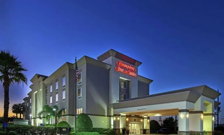 Hotel exterior at night at Hampton Inn & Suites Houston-Bush Intercontinental Aprt.