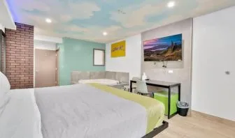 Day use room with TV at Exclusivo Inn & Suites. 