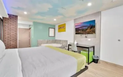 Day use room with TV at Exclusivo Inn & Suites. 