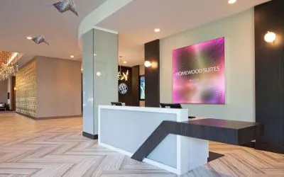 Reception desk at Homewood Suites By Hilton Los Angeles International Airport.