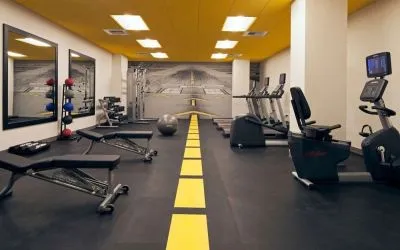 Fitness center at Homewood Suites By Hilton Los Angeles International Airport.