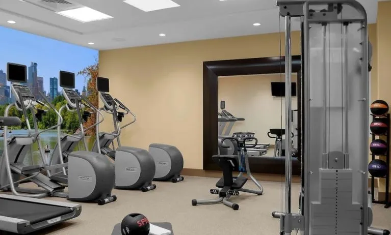 Fully equipped fitness center at Hilton Garden Inn New York/Times Square Central.