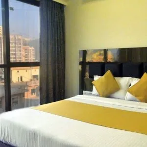 Cozy king room at THE BEST HOTEL MUMBAI.