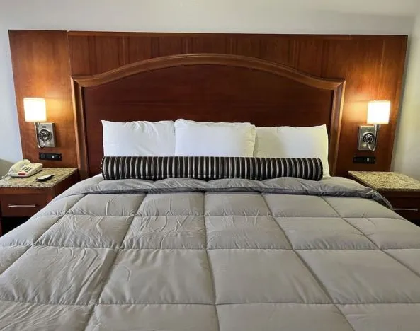 King bed at Casa Rosa Inn.