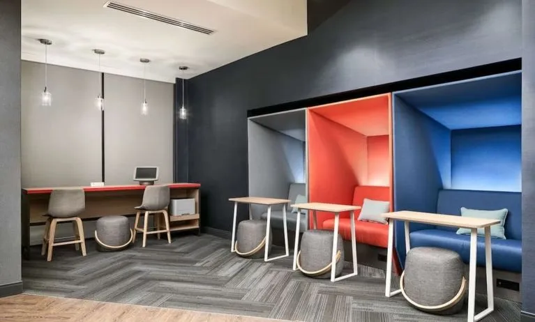 Coworking pods at Tru By Hilton Ft. Lauderdale Airport.