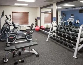 Fully equipped fitness center at Hampton Inn Los Angeles-Orange County-Cypress.