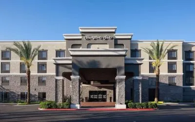 Entrance and parking area at Hampton Inn Los Angeles-Orange County-Cypress.