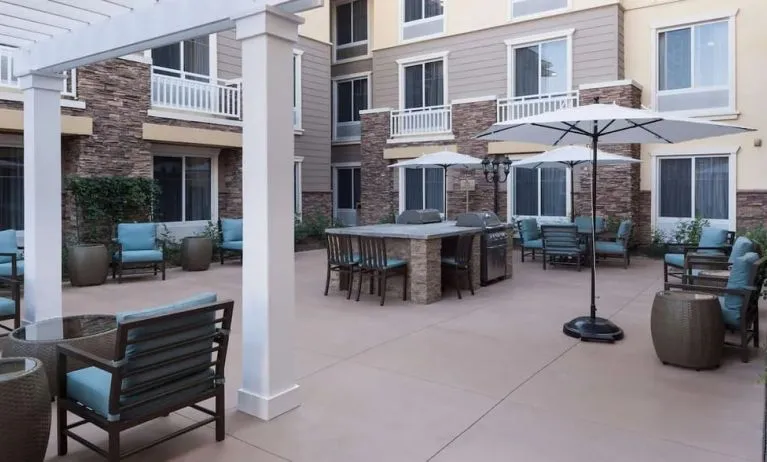 Outdoor lounge area at Homewood Suites By Hilton Agoura Hills.