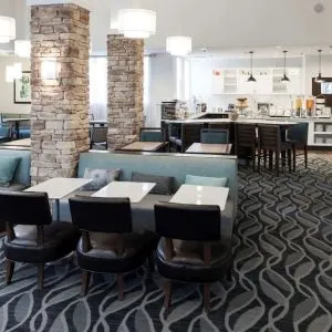 Dining area with comfortable seating perfect for coworking at Homewood Suites By Hilton San Jose Airport-Silicon Valley.
