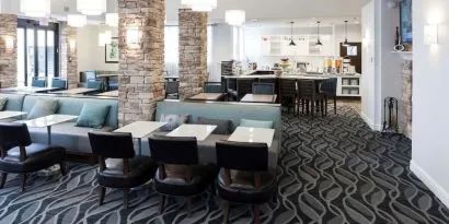 Dining area with comfortable seating perfect for coworking at Homewood Suites By Hilton San Jose Airport-Silicon Valley.