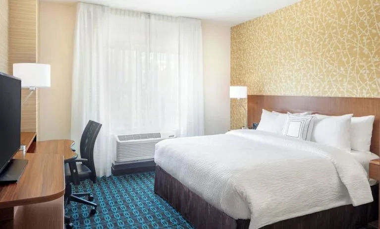 King room with work desk and TV at Fairfield Inn & Suites By Marriott North Bergen.