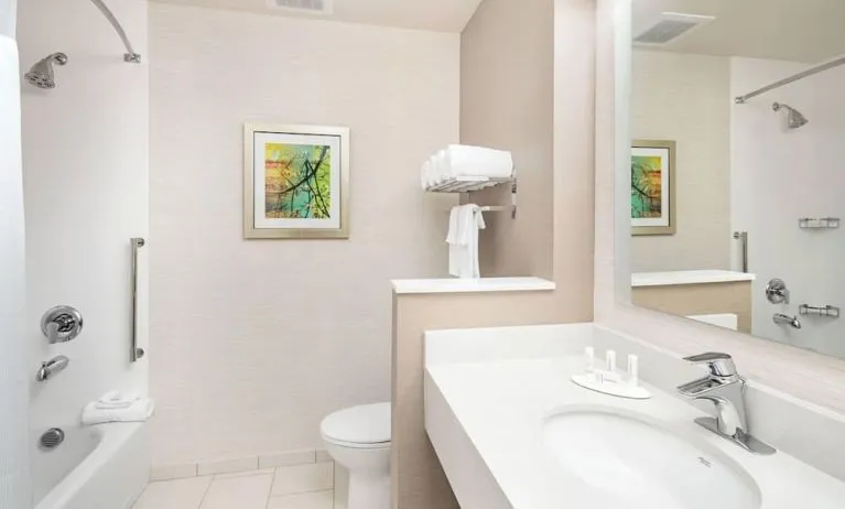 Guest bathroom with shower at Fairfield Inn & Suites By Marriott North Bergen.