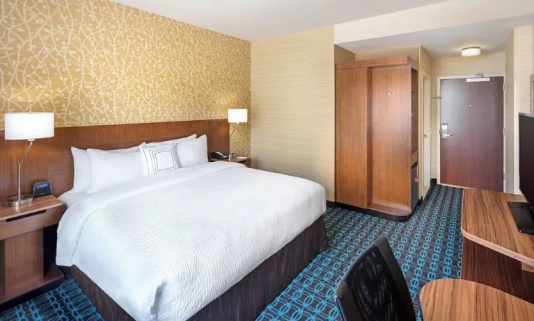 King room with work desk and TV at Fairfield Inn & Suites By Marriott North Bergen.