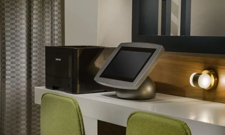 Business center with computer, printer and ergonomic chairs at Hilton Garden Inn Sunnyvale.