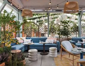 Dining area at Kimpton Theta New York - Times Square.