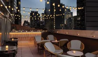 Terrace lounge area at Kimpton Theta New York - Times Square.