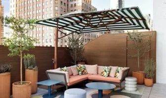 Terrace lounge seating at Kimpton Theta New York - Times Square.