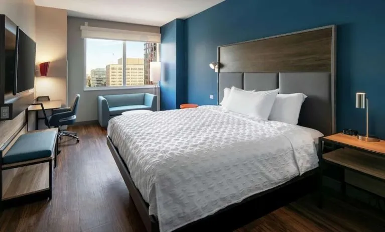 King bed at Tru By Hilton Denver Downtown Convention Center.