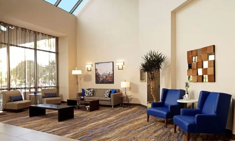 Lobby lounge at Embassy Suites By Hilton Los Angeles-Intl Airport North.