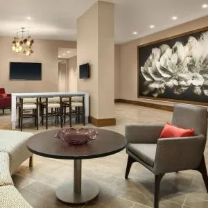 Lounge area and coworking space at Crowne Plaza Dallas Market Ctr - Love Field.