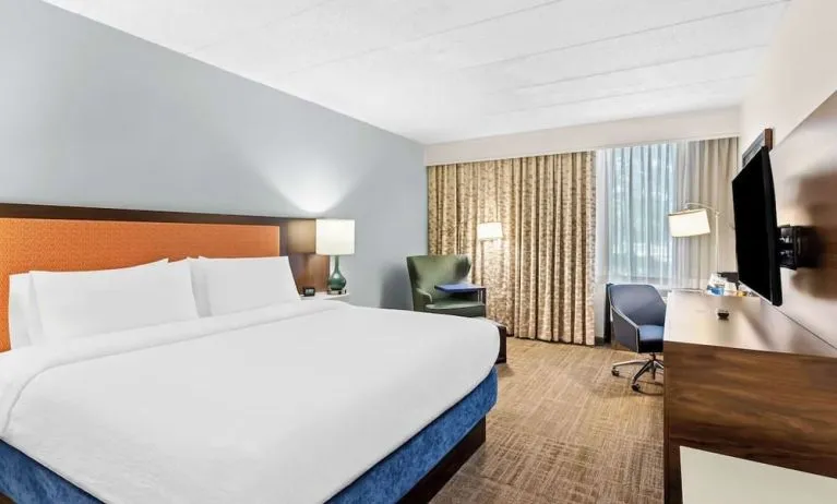 Bright and spacious day use room with work desk at Hampton Inn Chicago/Naperville.