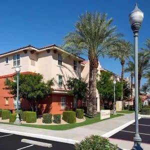 Exterior view and parking area at Sonesta Simply Suites Phoenix Scottsdale.