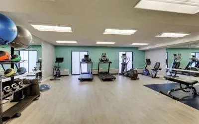 Fully equipped fitness center at Sonesta Select Scottsdale At Mayo Clinic Campus.