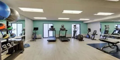 Fully equipped fitness center at Sonesta Select Scottsdale At Mayo Clinic Campus.