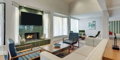 Lobby lounge with fireplace at Sonesta Select Scottsdale At Mayo Clinic Campus.