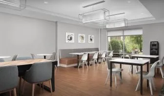 Dining area perfect for coworking at TownePlace Suites Franklin Cool Springs.
