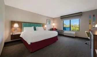 Spacious day use room with work desk at Hampton Inn Detroit Southfield.
