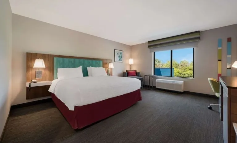 Spacious day use room with work desk at Hampton Inn Detroit Southfield.
