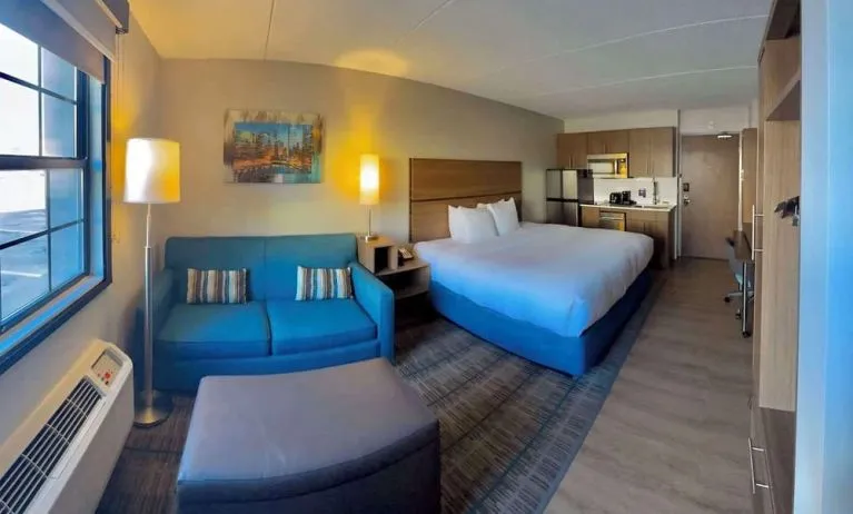 Day use room with workspace, in-room kitchen and living area at MainStay Suites Oak Brook Terrace - Chicago.