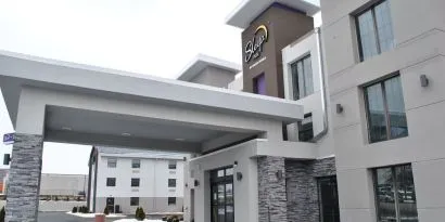 Entrance and parking area at Sleep Inn Oakbrook Terrace.
