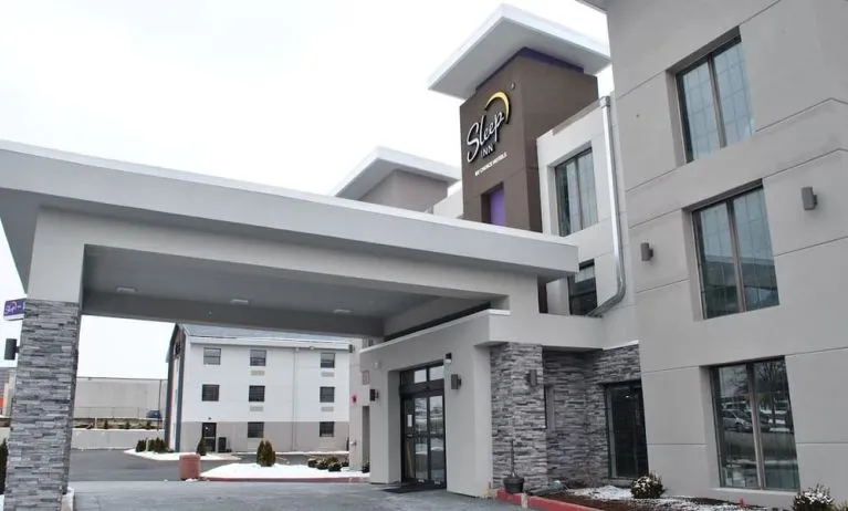 Entrance and parking area at Sleep Inn Oakbrook Terrace.
