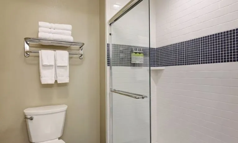 Private gueest bathroom with shower and free toiletries at Staybridge Suites Washington D.C.- Greenbelt.