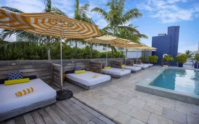 Outdoor pool with lounge beds at Catalina Hotel & Beach Club.