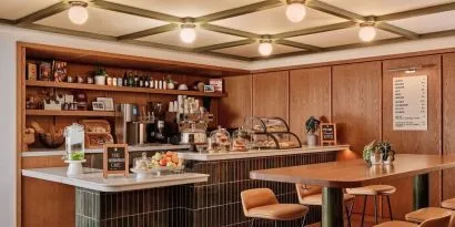 Hotel's coffee shop perfect for coworking at Romer Hell's Kitchen.