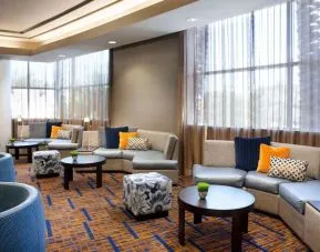 Lobby lounge and workspace at Sonesta Emeryville Oakland.