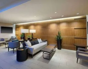 Lobby lounge and workspace at Hilton Indianapolis Hotel & Suites.