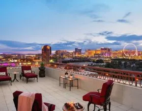 Rooftop terrace with lounge seating at Embassy Suites By Hilton Convention Center Las Vegas.